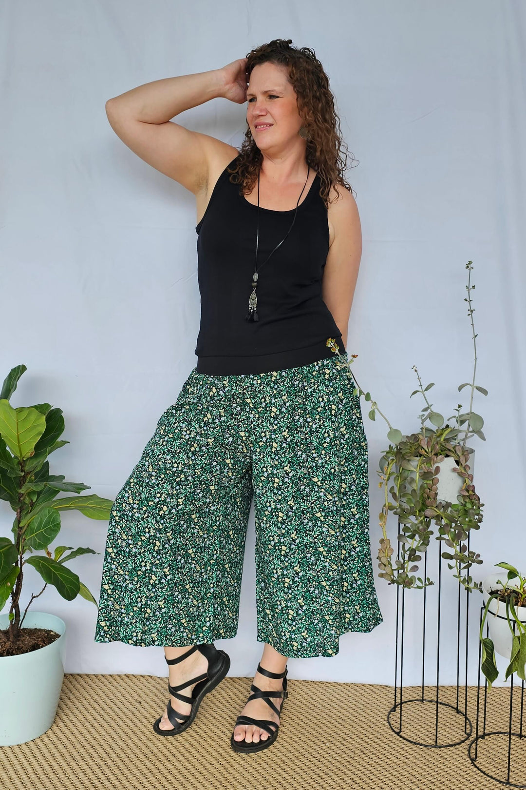 Front view of model wearing Green Bloom 7/8 Palazzo Pants showcasing wide leg fit