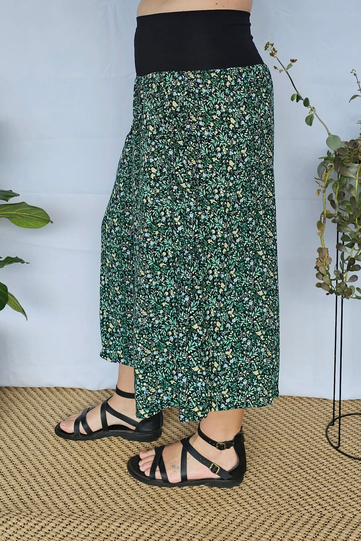 Side profile highlighting the flowy silhouette of Green Bloom 7/8 Palazzo Pants