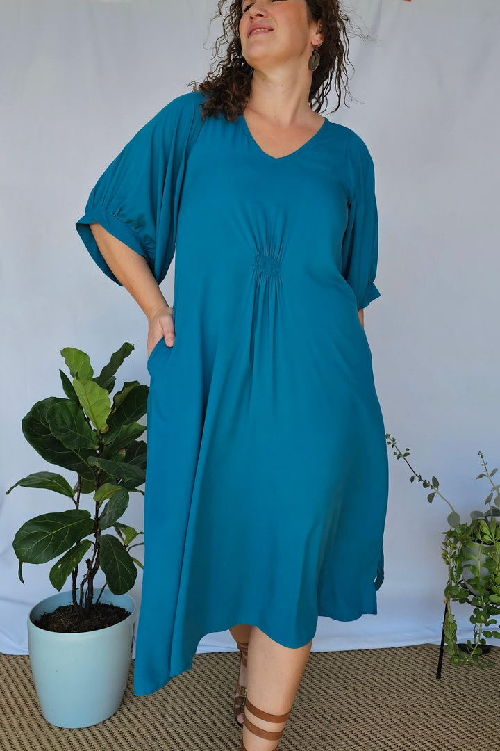 Close-up of rayon fabric and shirred panel on Isla bell sleeve dress