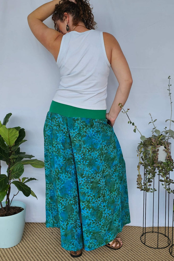 Back view of model wearing Teal Tall Palazzo Pants in wide leg fit
