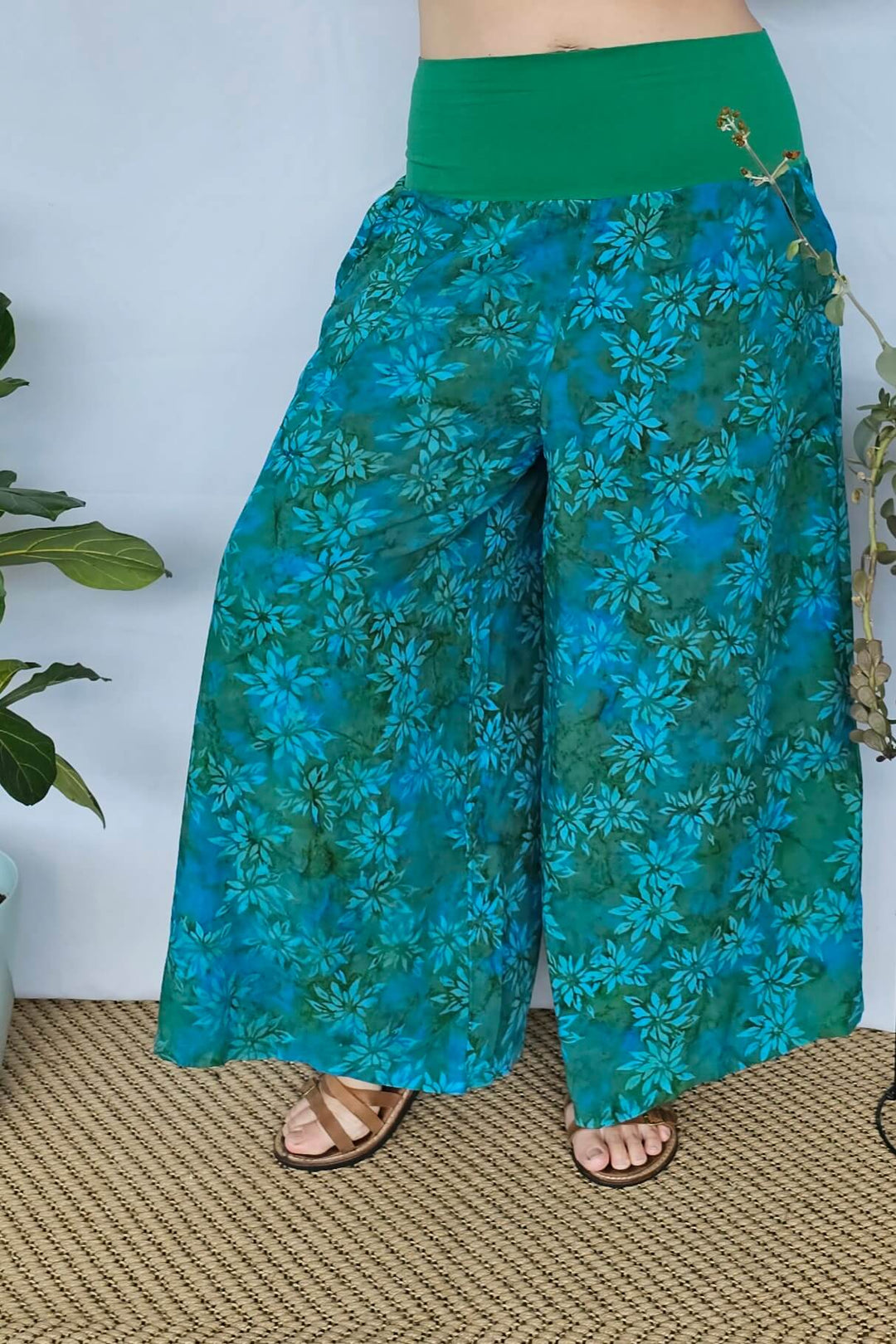 Close-up of cotton waistband and batik-style teal fabric