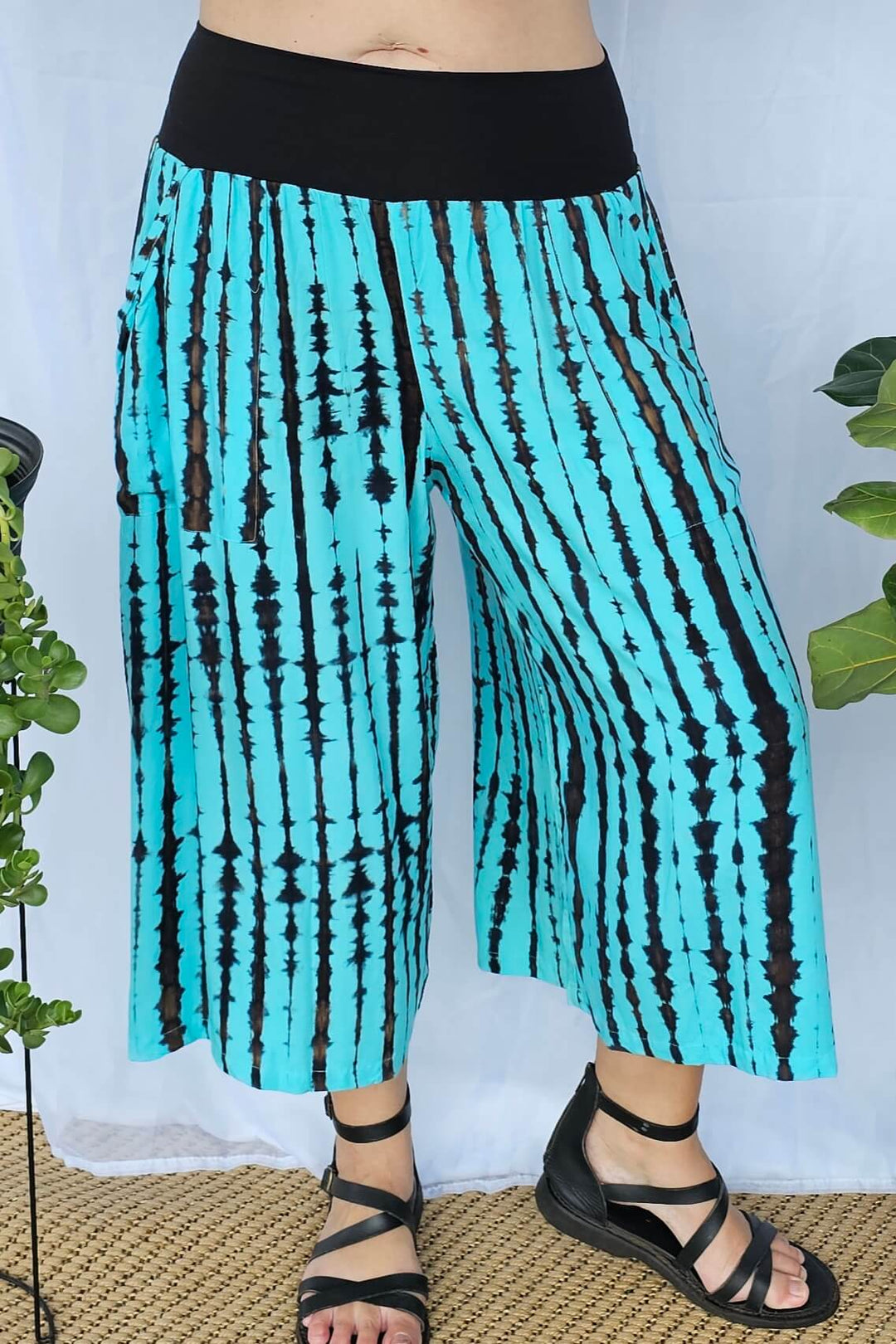 Front view of Sea Breeze wide-leg palazzo pants showing breathable rayon fabric and relaxed cropped length.