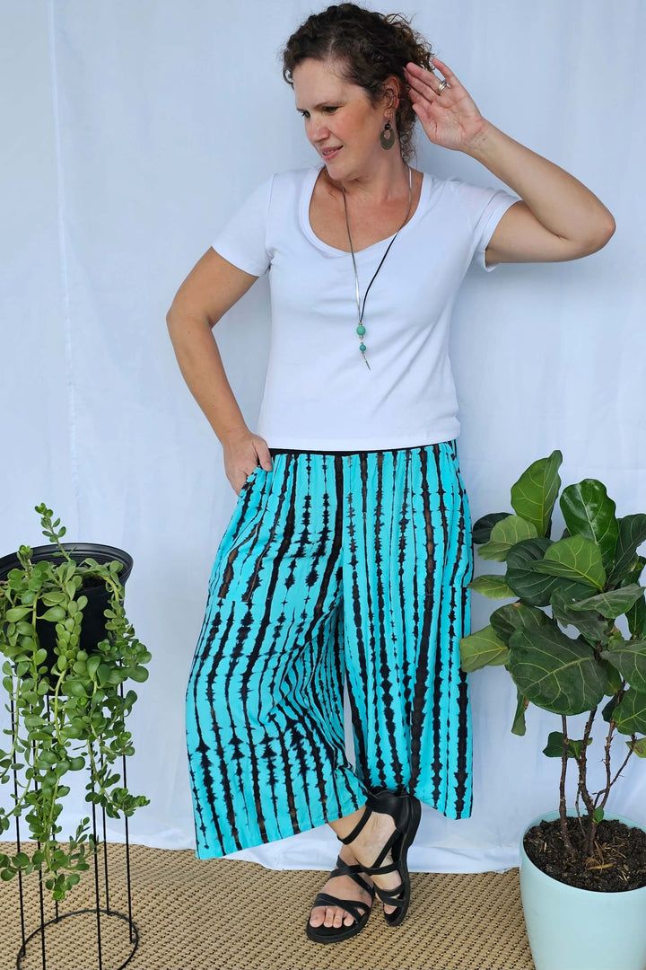 Sea Breeze palazzo pants with flowing wide-leg cut and comfortable waistband designed for everyday summer wear.