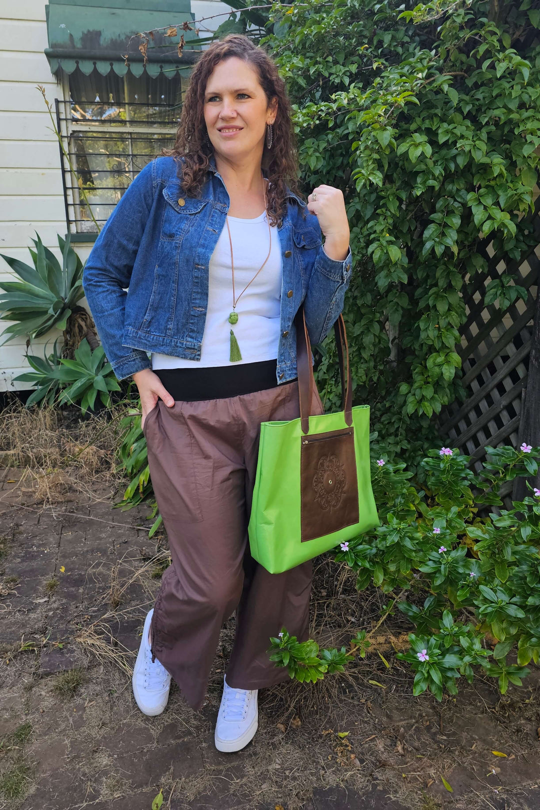 Model wearing Coffee Cotton Pants with oversized tee – plus size casual look