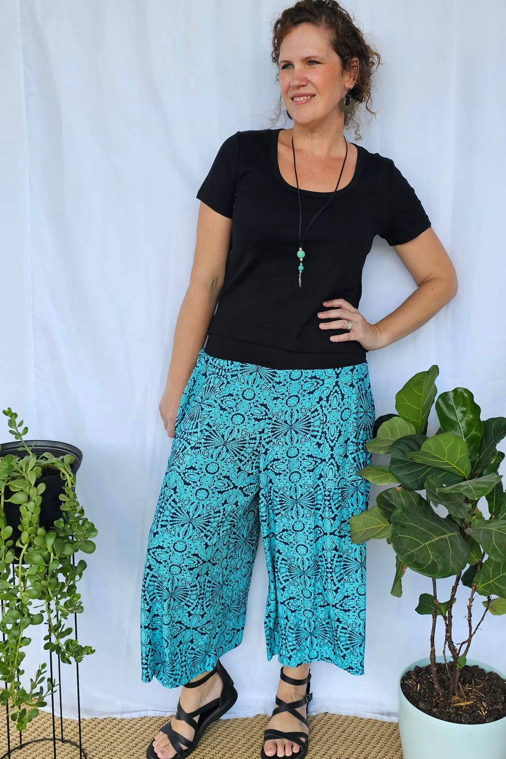 Model wearing Blue Mandala 7/8 Palazzo Pants with a relaxed wide-leg silhouette and supportive stretch waistband.
