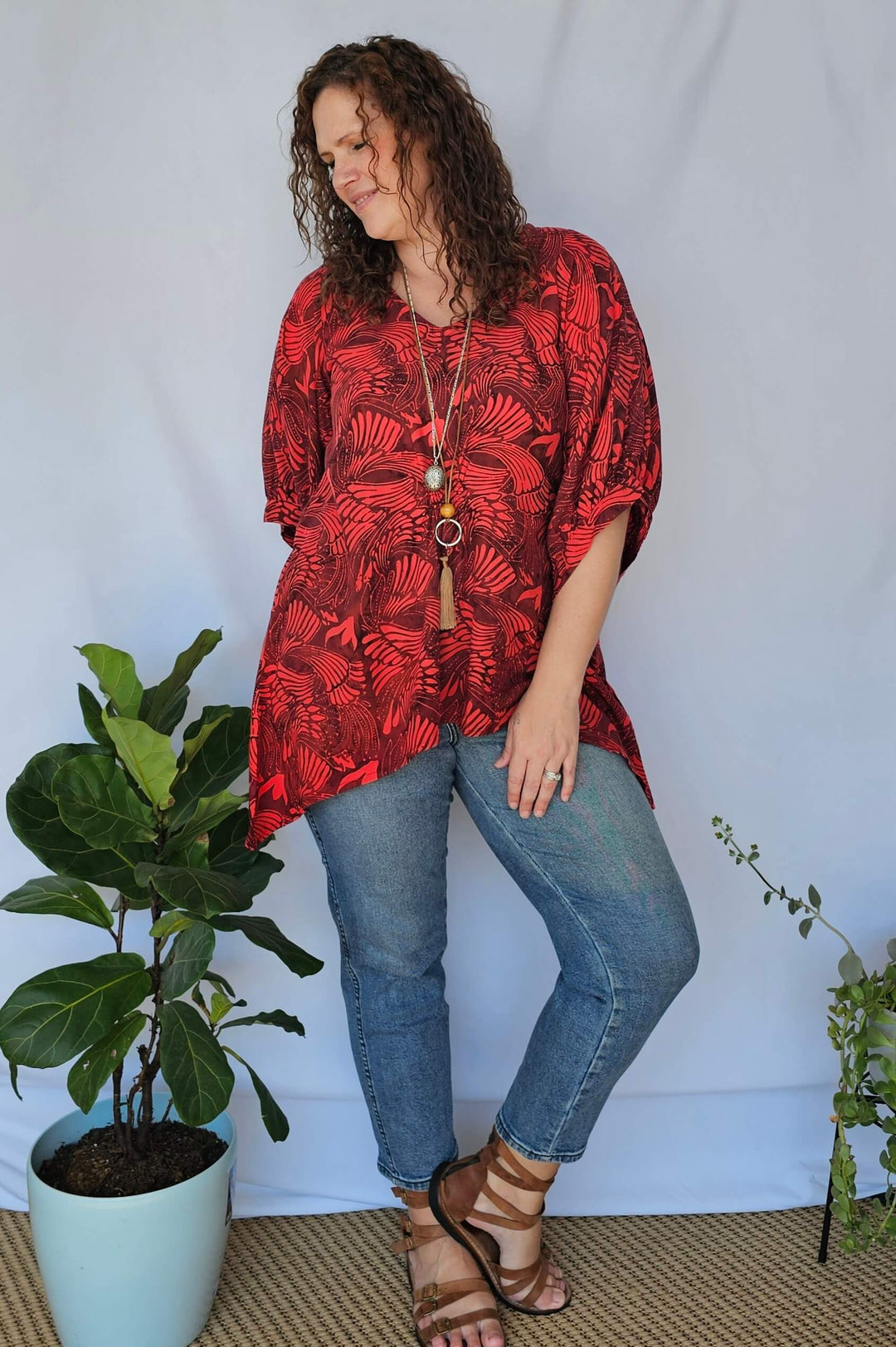 Model wearing wine Isla Top with black jeans – plus size styling idea