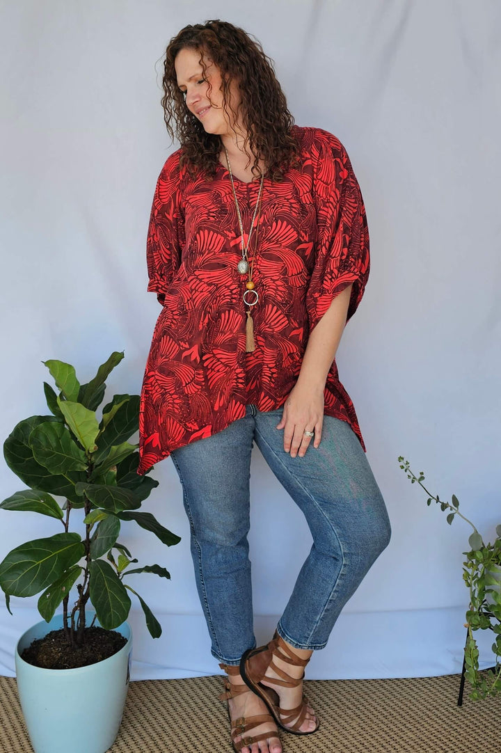 Model wearing wine Isla Top with black jeans – plus size styling idea